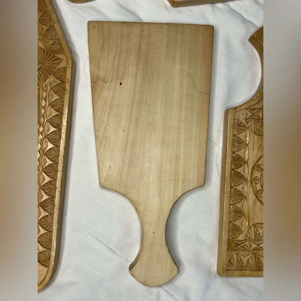 Handcrafted Wooden Wall Decor with Intricate Carvings